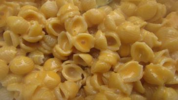 How do you fix gritty cheese sauce?