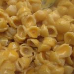 How do you fix gritty cheese sauce?