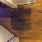 How do you get dark water stains out of unfinished wood?