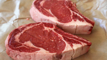 How do you grill a 2 inch ribeye steak?