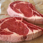 How do you grill a 2 inch ribeye steak?