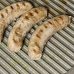 How do you grill brats without boiling them?