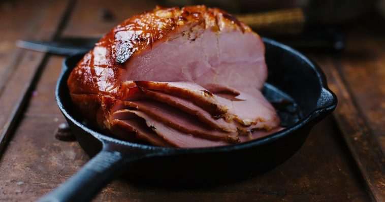 How do you heat up a precooked ham without drying it out?