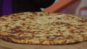 How do you make a thin crust pizza with store bought dough?