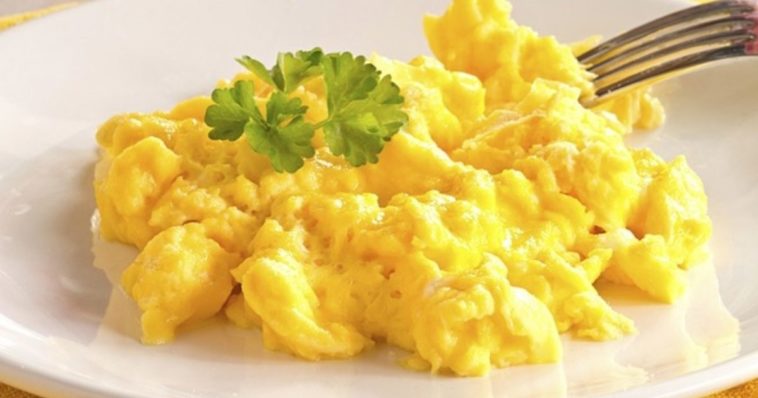 How do you make scrambled eggs taste better?