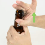 How do you open a bottle without a bottle opener?