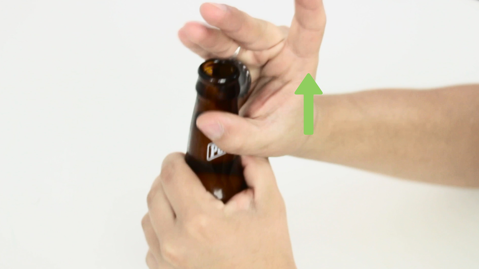 How do you open a bottle without a bottle opener?