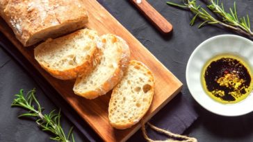 How do you reheat bread without it getting hard?