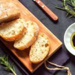 How do you reheat bread without it getting hard?