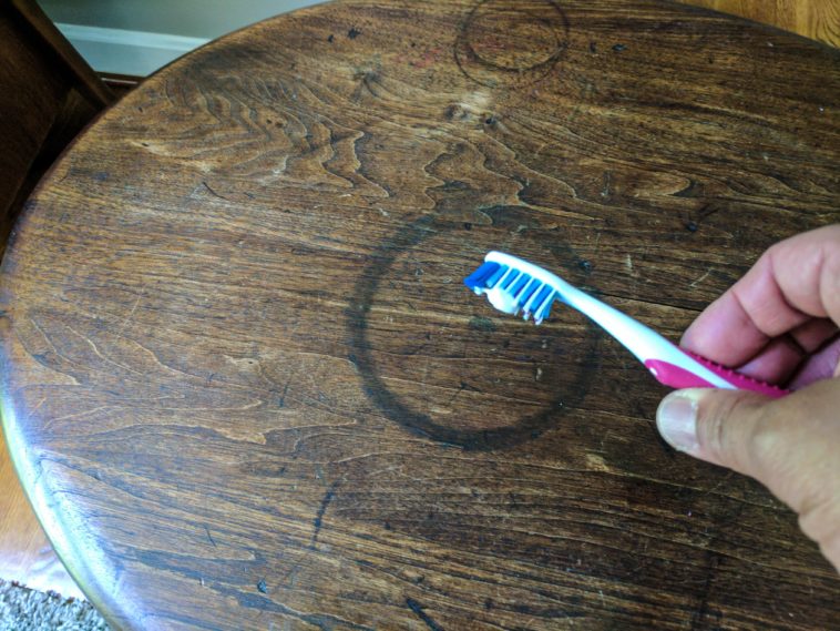 How do you remove white water stains from wood?