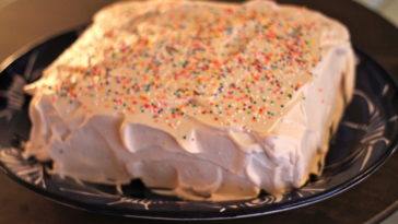 How do you store a cake with whipped cream frosting?