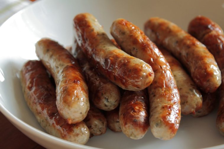 How do you tell if a sausage is cooked?