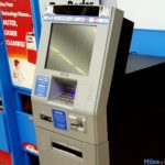 How do you use Walmart photo kiosk?