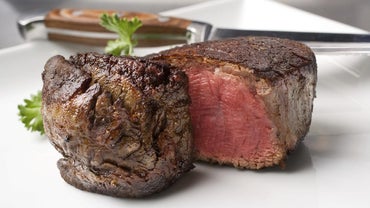How do you warm up a precooked prime rib?