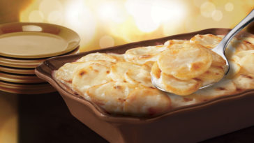 How do you warm up frozen scalloped potatoes?