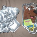 How do you wash Wilton cake pans?