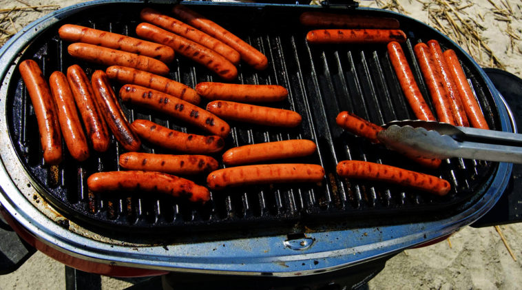 How long do you cook a hot dog on the grill?