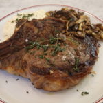 How long do you cook bone-in ribeye?