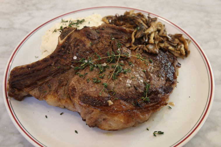 How long do you cook bone-in ribeye?