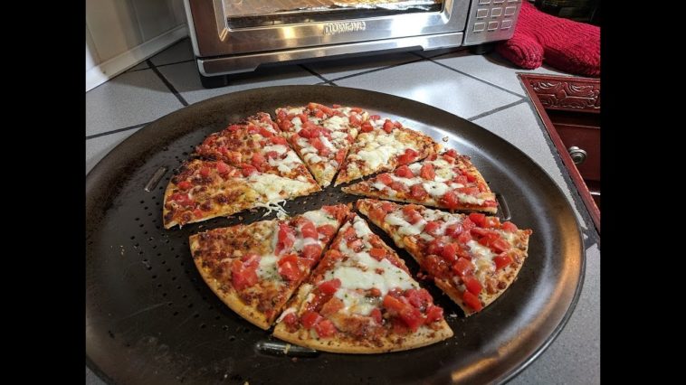 How long do you put a party pizza in the oven?