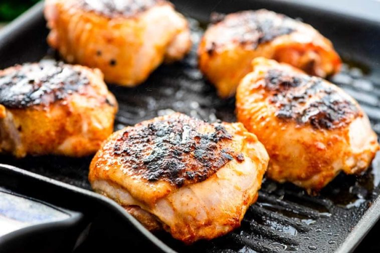 How long does it take to grill chicken thighs at 350?