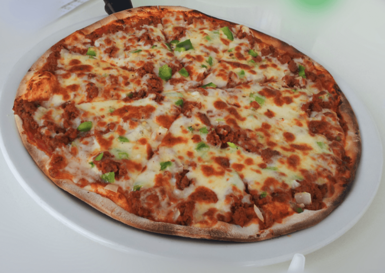 How long is frozen pizza dough good in the fridge?