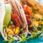 How long should you cook bacon on each side?