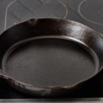 How many times do you season a cast iron skillet?