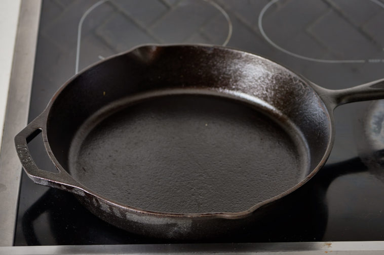 How many times do you season a cast iron skillet?