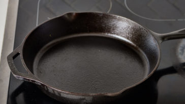 How many times do you season a cast iron skillet?