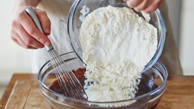 How much flour should I add to the cake batter?