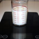 How much is 100 ml of water in ounces?