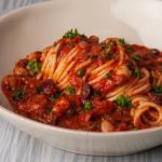 How much wine should I add to my spaghetti sauce?