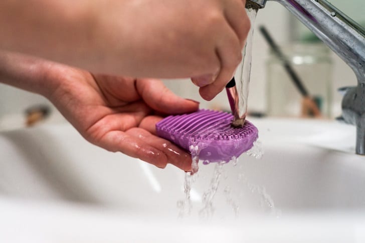 How often should I wash my drying mat?