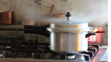 How often should a pressure cooker jiggle?