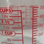 Is 50 ml half a cup?
