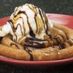 Is Churro the same as funnel cake?