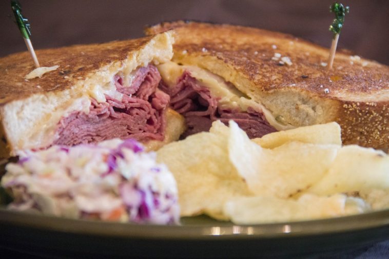 Is a Reuben made with pastrami or corned beef?