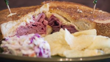 Is a Reuben made with pastrami or corned beef?