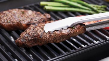 Is cast iron or stainless steel better for searing?