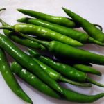 Is green chilli bad for stomach?