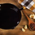 Is it OK to season cast iron with olive oil?