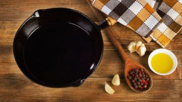 Is it OK to season cast iron with olive oil?