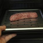 Is it better to bake or broil sausage?