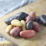 Is it better to boil potatoes whole or cut up for potato salad?