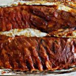 Is it better to cook ribs covered or uncovered?