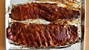 Is it better to cook ribs covered or uncovered?