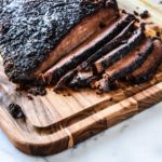 Is it better to smoke a brisket at 225 or 250?