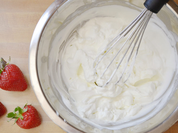 Is it better to whip cream in a glass or metal bowl?