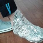 Is it safe to wrap your feet in aluminum foil?